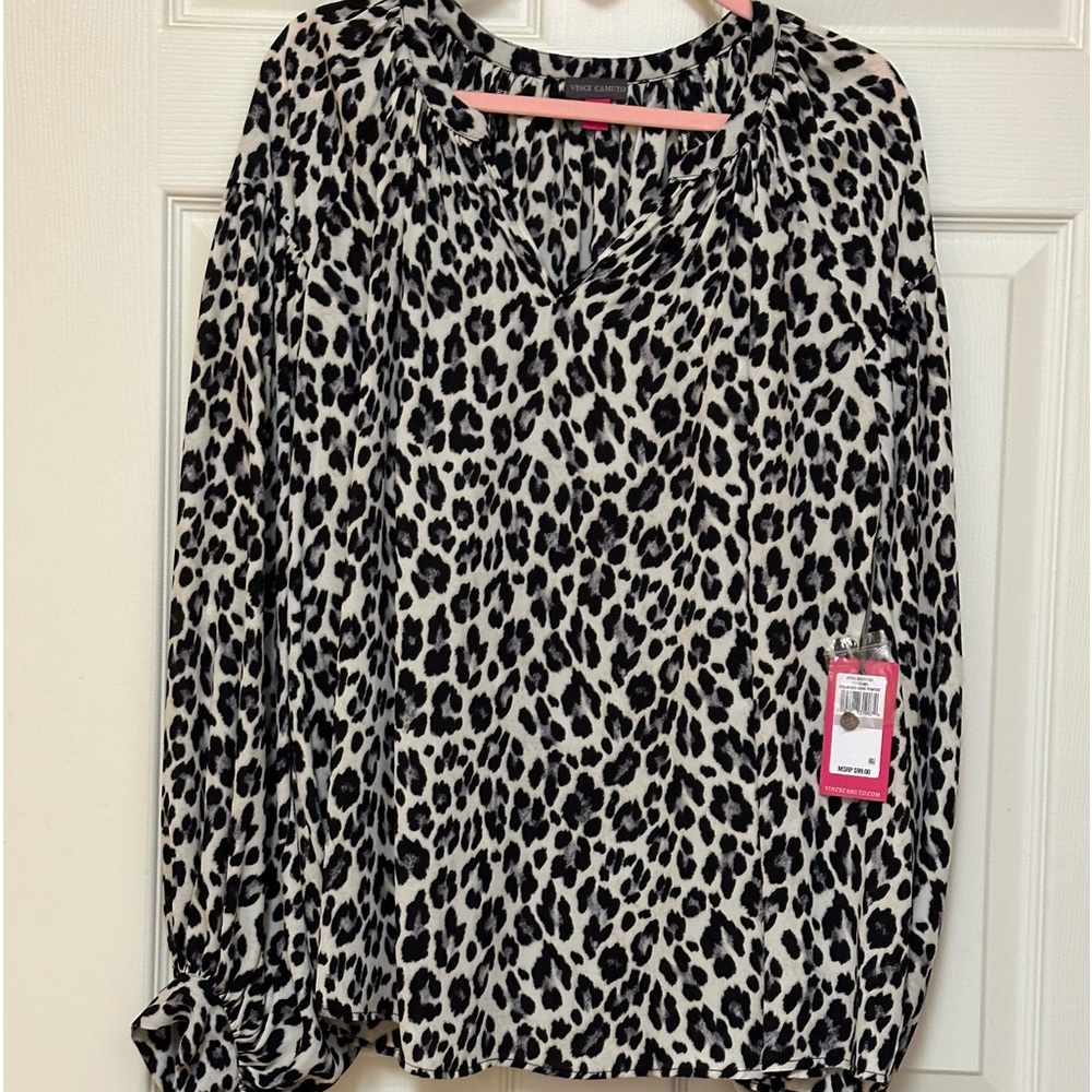 Brand new Vince Camuto blouse. Size 1X, never worn, animal print blouse.